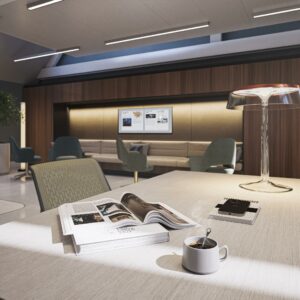 Moderne wachtruimte aan de Nieuwezijds Voorburgwal met een stijlvolle leestafel, designlamp en comfortabele zitplaatsen.